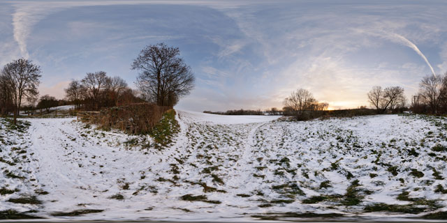 Snowy field at sunset 360° Panorama